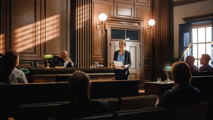 Court of Justice and Law Trial: Successful Female Public Defender Presenting the Case, Making Passionate Speech to Judge, Jury. Attorney Lawyer Protecting Client with Closing Not Guilty Arguments.